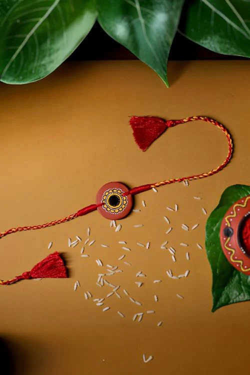 Antarang  (Set Of 2) Terracotta. Antarang-Terracotta.Suraj- Handpainted Terracotta Rakhi Made By Divyang Rural Women - Image 2