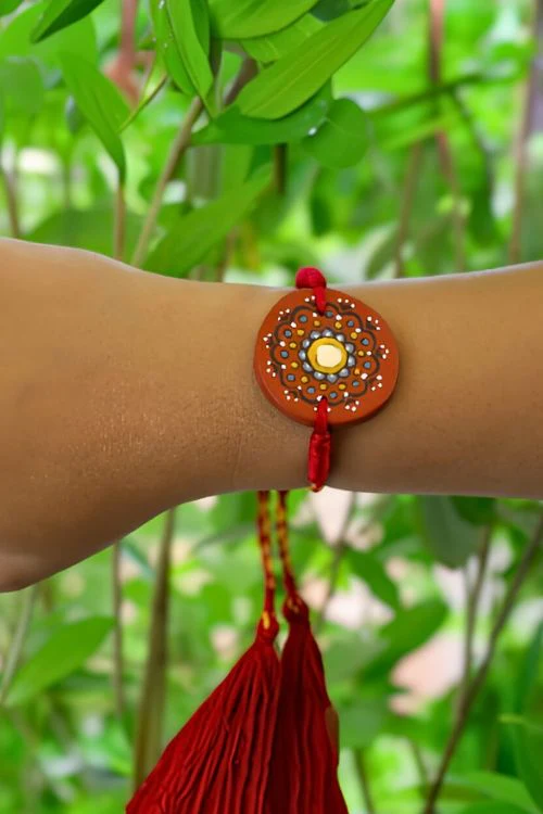 Antarang (Set Of 2) Terracotta. Antarang-Terracotta. Taaramandal- Handpainted Terracotta Rakhi. Made By Divyang Rural Women