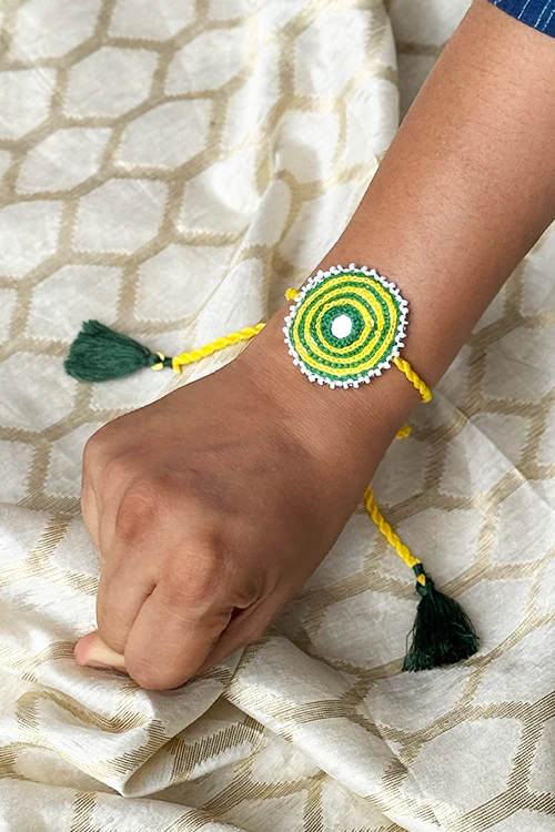 Antarang Yellow Green Bhai-Bhabhi Rakhi Set - Image 4