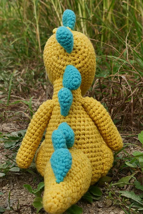 Himalayan Blooms Hand Made Crochet Soft Toys - Sitting Dinosaur - Image 4