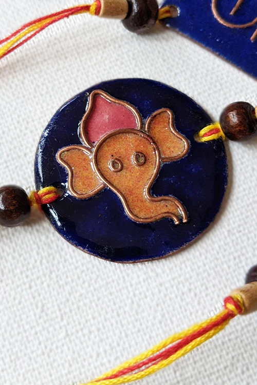 Okhai 'Dulari' Ganesh Copper Enamel Rakhi
