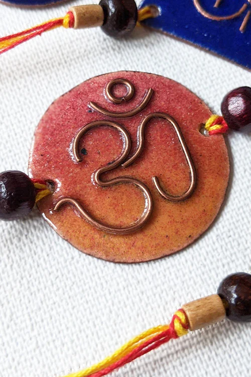 Okhai 'Dulari' Yellow Copper Enamel Rakhi