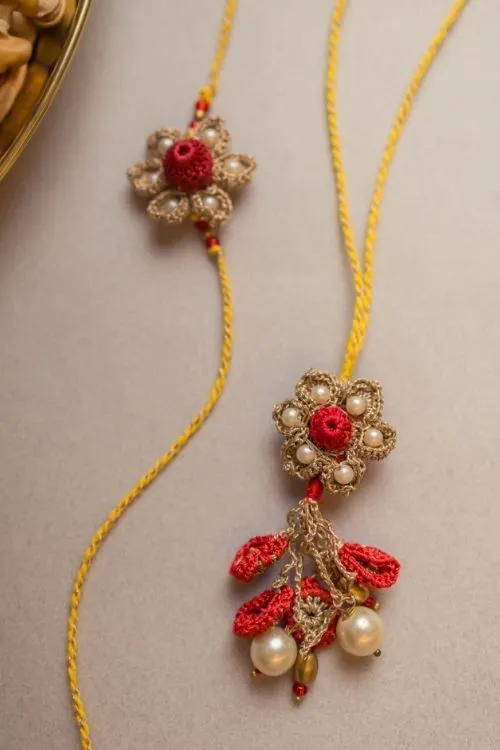 Samoolam Antique Flower Crochet Rakhi & Lumba Set (Set Of 2) - Image 2