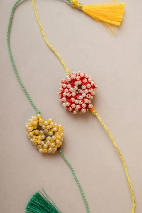Samoolam Beaded Coral Crochet Rakhi (Set of 2) - Image 4
