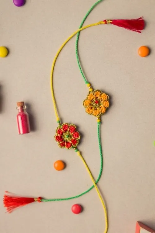 Samoolam Festive Marigold Crochet Rakhi Set (Set Of 2)