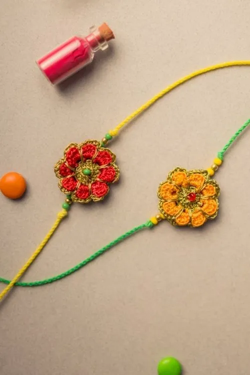 Samoolam Festive Marigold Crochet Rakhi Set (Set Of 2) - Image 4