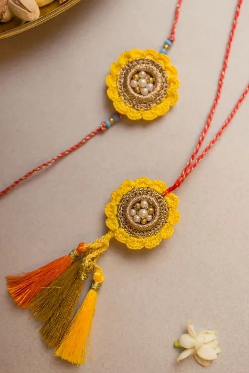 Samoolam Marigold Crochet Rakhi & Lumba Set (Set Of 2) - Image 2
