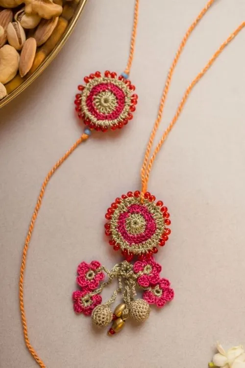 Samoolam Pink Twilight Crochet Rakhi & Lumba Set (Set Of 2) - Image 2