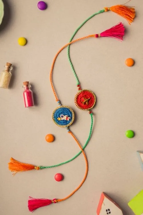 Samoolam Universe Crochet Rakhi Set (Set Of 2)