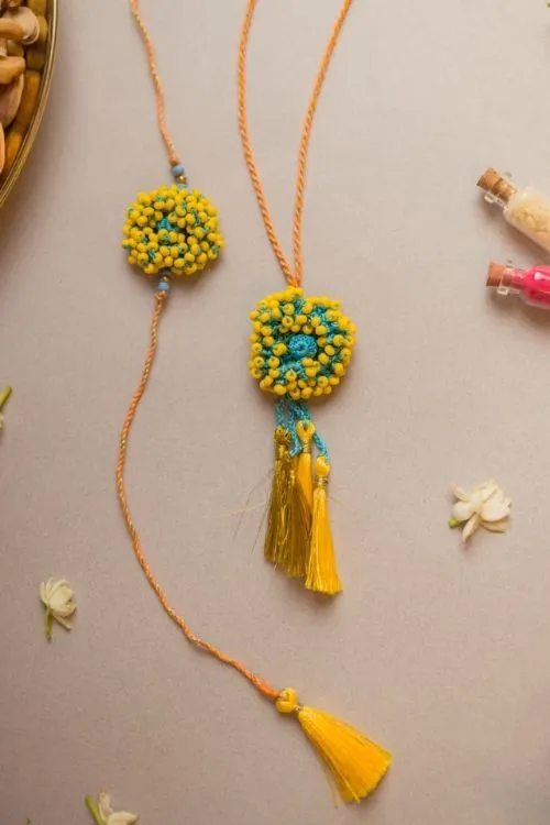 Samoolam Yellow Coral Crochet Rakhi & Lumba Set (Set Of 2) - Image 2