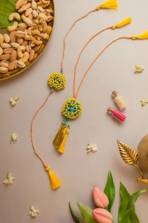 Samoolam Yellow Coral Crochet Rakhi & Lumba Set (Set Of 2) - Image 3