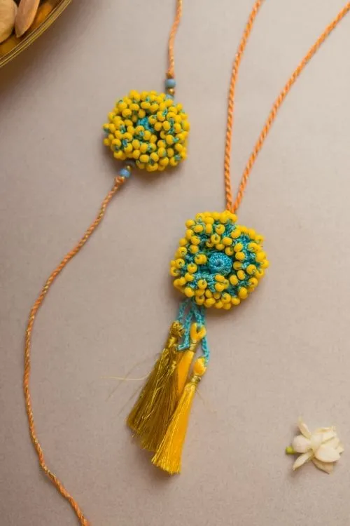 Samoolam Yellow Coral Crochet Rakhi & Lumba Set (Set Of 2) - Image 4
