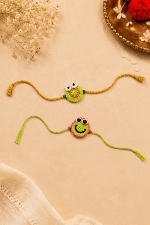 WHE Handmade Crochet Smiley Face Rakhi